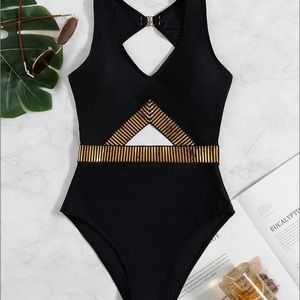 Cut out black and gold one piece swimsuit, Taylor Swift reputation style